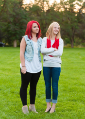 Two girls on grass photo