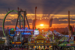 Deschutes County Fair rides with sunset in background