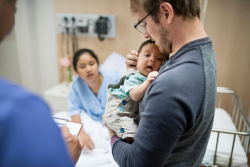 family with newborn baby