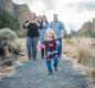 Happy hiking family photo on desert path