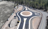 Aerial view of a new roundabout under construction at S Century Drive and Huntington Road.